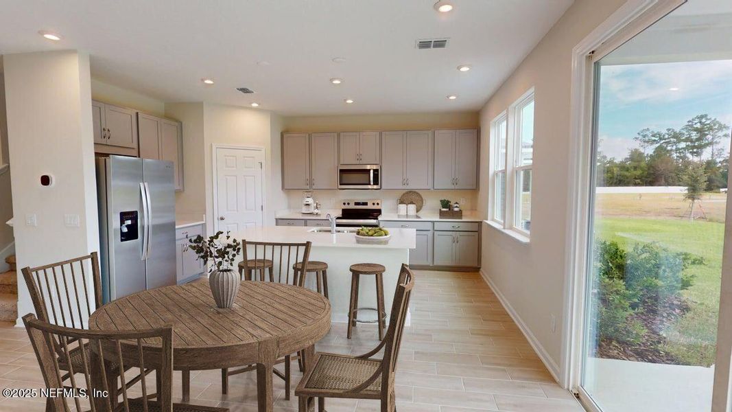 Furnished interior view inside a new home in Sandridge Hills, Green Cove Springs (Image 3).