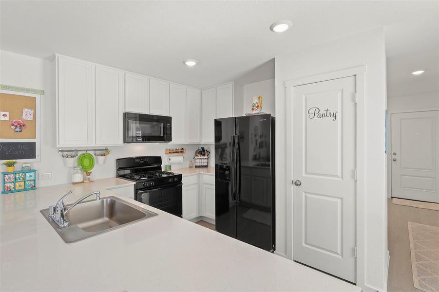 Furnished interior view inside a new home in Mobberly Farms, Pilot Point (Image 8).
