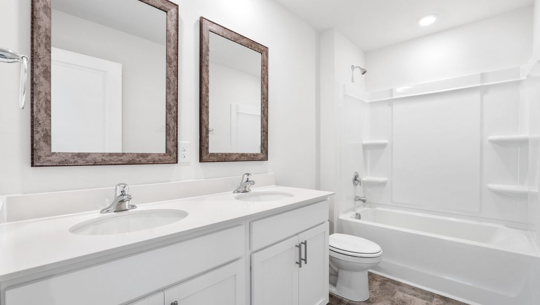 Representative furnished interior of a home built from the PENWELL by D.R. Horton in Cascade Point, Seneca (Image 13).