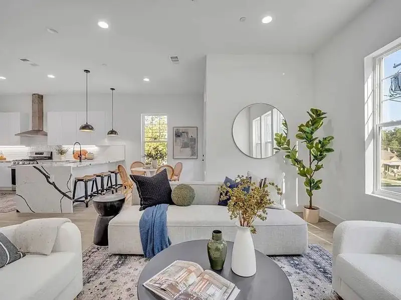 Living area featuring recessed lighting and baseboards