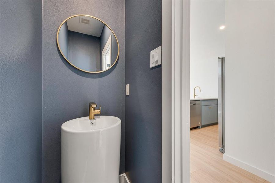 Bathroom featuring wood-type flooring