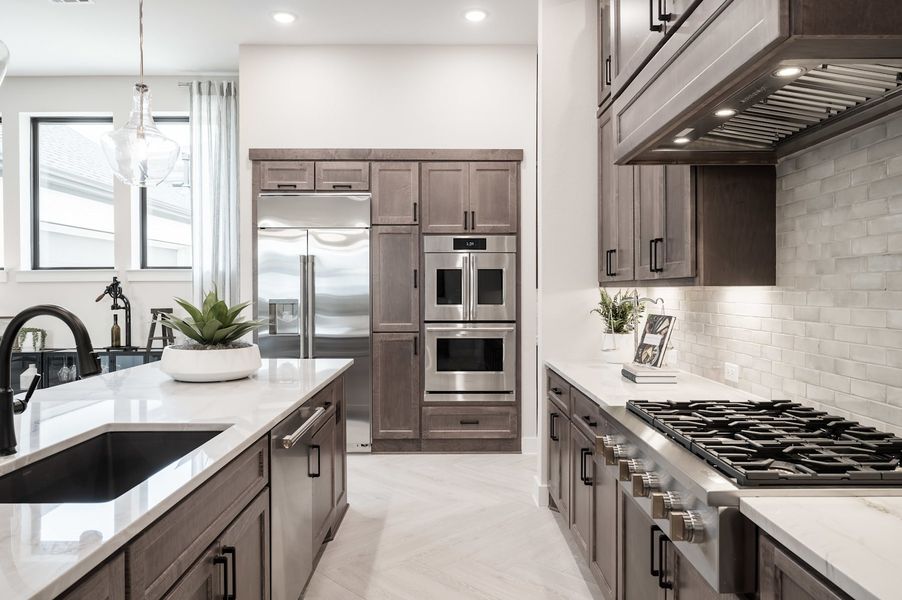 Representative furnished interior of a home built from the Carignan by Tri Pointe Homes in Woodson’s Reserve, Spring (Image 45).