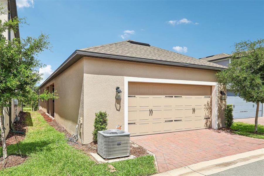 Front exterior of a new home in , Winter Garden, FL, highlighting curb appeal (Image 1). Front exterior of a new home in , Winter Garden, FL, highlighting curb appeal (Image 1).