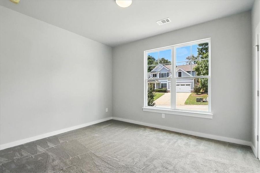Spacious, unfurnished interior of a new home in Traditions of Braselton, Jefferson (Image 42).