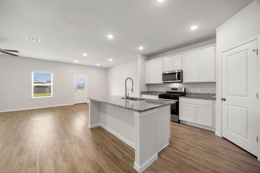 Furnished interior view inside a new home in Granger Pines, Conroe (Image 16).