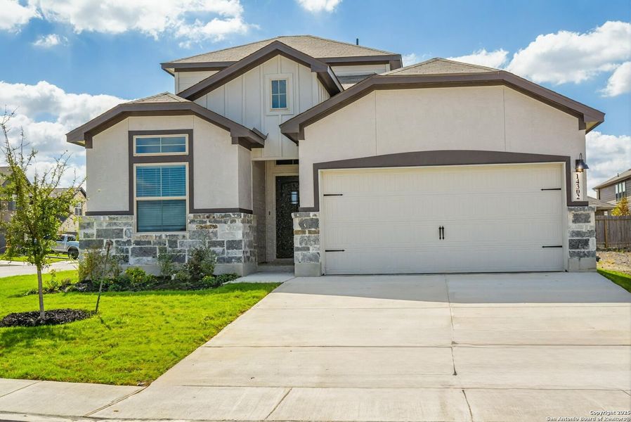 Front exterior of a home in the Morgan Meadows community, located in San Antonio, TX (Image 4).