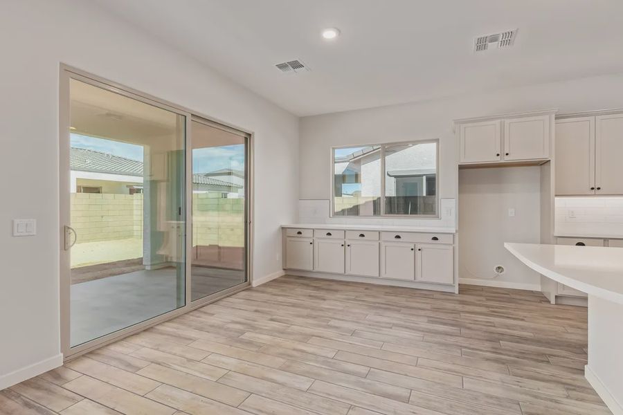 Furnished interior view inside a new home in Valencia at Granite Vista, Waddell (Image 6).