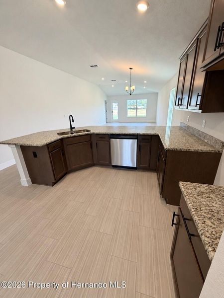 Furnished interior view inside a new home in Winding Oaks, Weeki Wachee (Image 6).