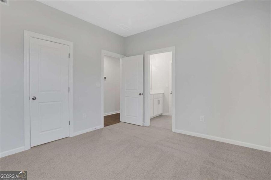 Spacious, unfurnished interior of a new home in The Paddocks at Doc Hughes, Buford (Image 48).