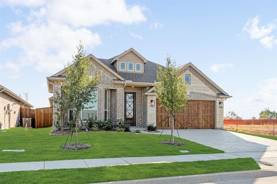 Front exterior of a new home in Stone River Glen 50s, Royse City, TX, highlighting curb appeal (Image 1). Front exterior of a new home in Stone River Glen 50s, Royse City, TX, highlighting curb appeal (Image 1).