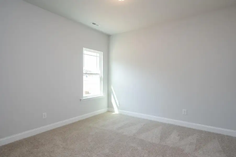 Representative unfurnished interior of a home built from the 2100 by Adams Homes in Ham Farm, La Grange (Image 32).