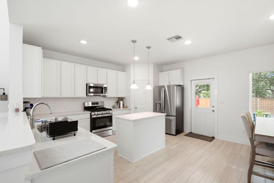 Furnished interior view inside a new home in Massey Oaks, Pearland (Image 19).