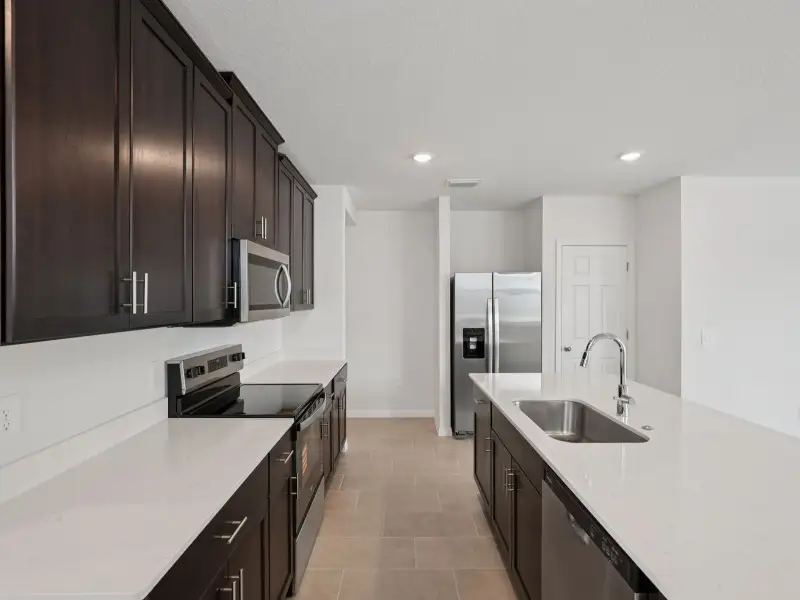 Furnished interior view inside a new home in Villamar - Classic Series, Winter Haven (Image 3).