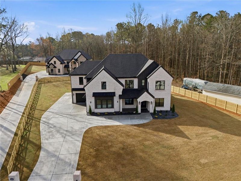 Front exterior of a new home in , Lawrenceville, GA, highlighting curb appeal (Image 28).