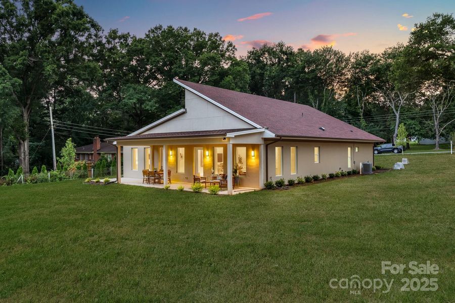 Rear of home and .65 acre yard