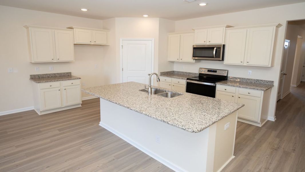 Representative furnished interior of a home built from the CALI by D.R. Horton in Island Green, Myrtle Beach (Image 9).