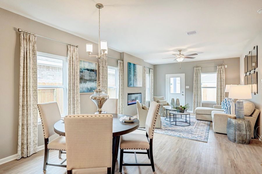 Dining into Family Room. Sample image for illustration; upgrades, options, and colors may vary.