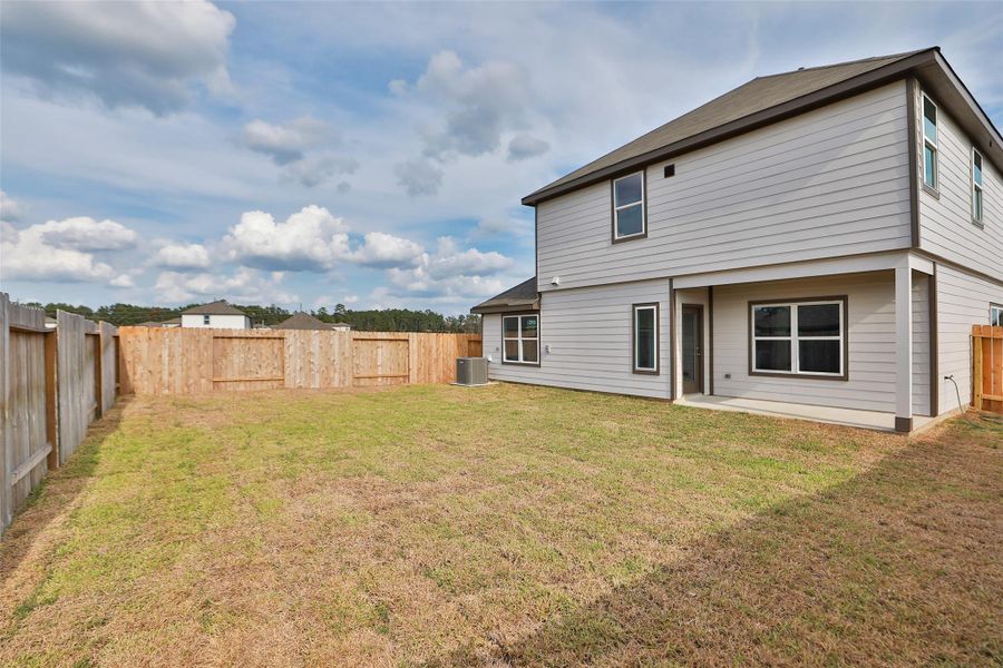 Exterior details and patio area of a home in Cielo, Conroe (Image 24). Exterior details and patio area of a home in Cielo, Conroe (Image 24).