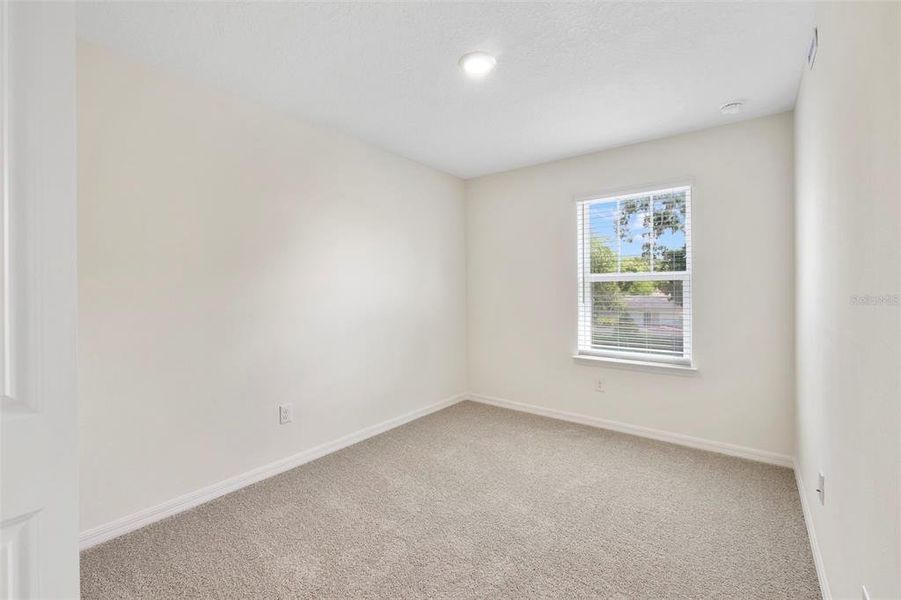 Spacious, unfurnished interior of a new home in Towns at Riverwalk, Sanford (Image 21).