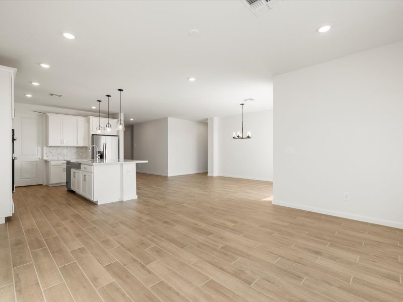 Spacious, unfurnished interior of a new home in White Tank Foothills Signature Series, Waddell (Image 7).