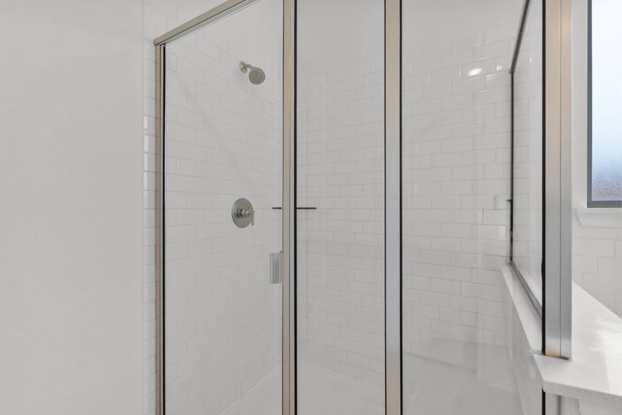 Primary bathroom.  Sample product photo. Actual exterior and interior selections may vary by homesite. Photo may be virtually staged.