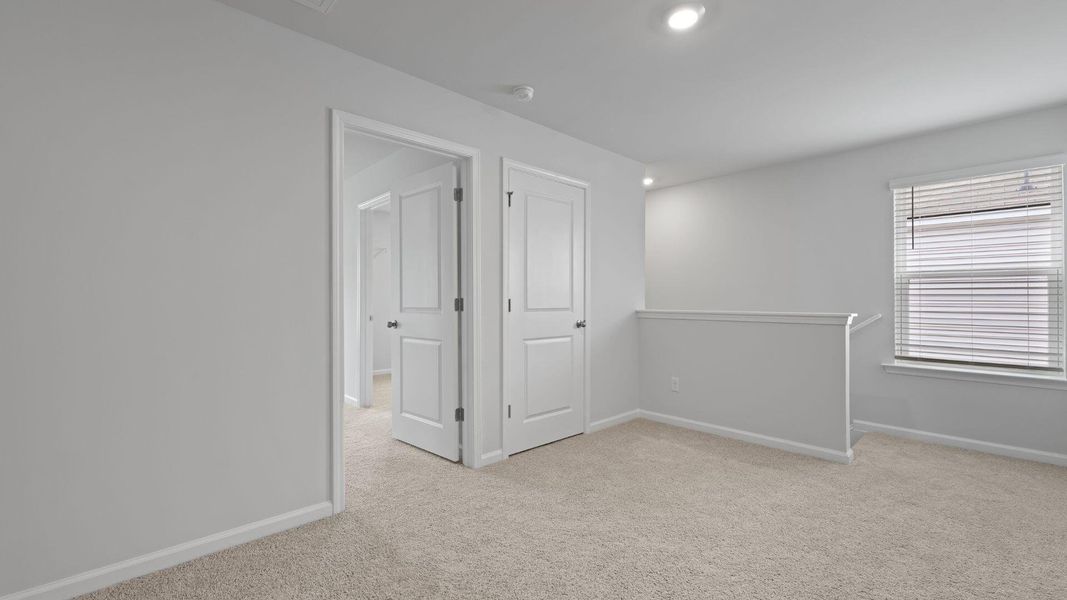 Spacious, unfurnished interior of a new home in Pine Hills at Cane Bay, Summerville (Image 14). Spacious, unfurnished interior of a new home in Pine Hills at Cane Bay, Summerville (Image 14).