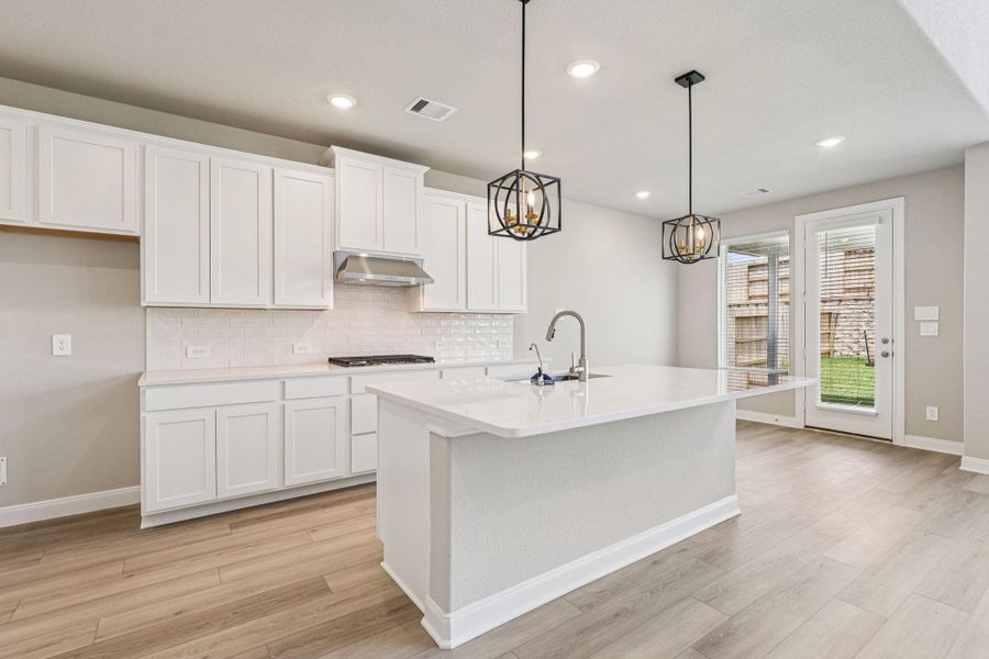 Photo is not of the actual home, but is an inspirational photo of builder’s model home and may depict options, furnishings, and/or decorator features that are not included