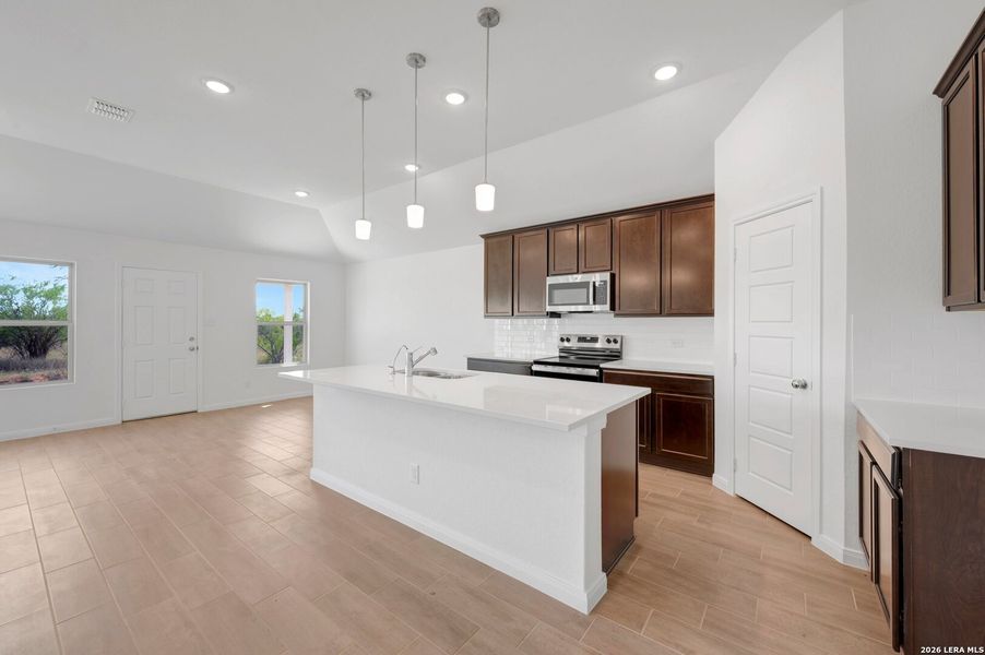 Furnished interior view inside a new home in Chaparral Ranch, Floresville (Image 10).