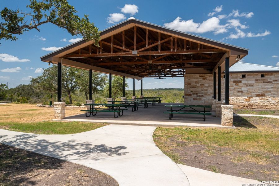 Front exterior of a new home in Hunters Ranch, San Antonio, TX, highlighting curb appeal (Image 30).