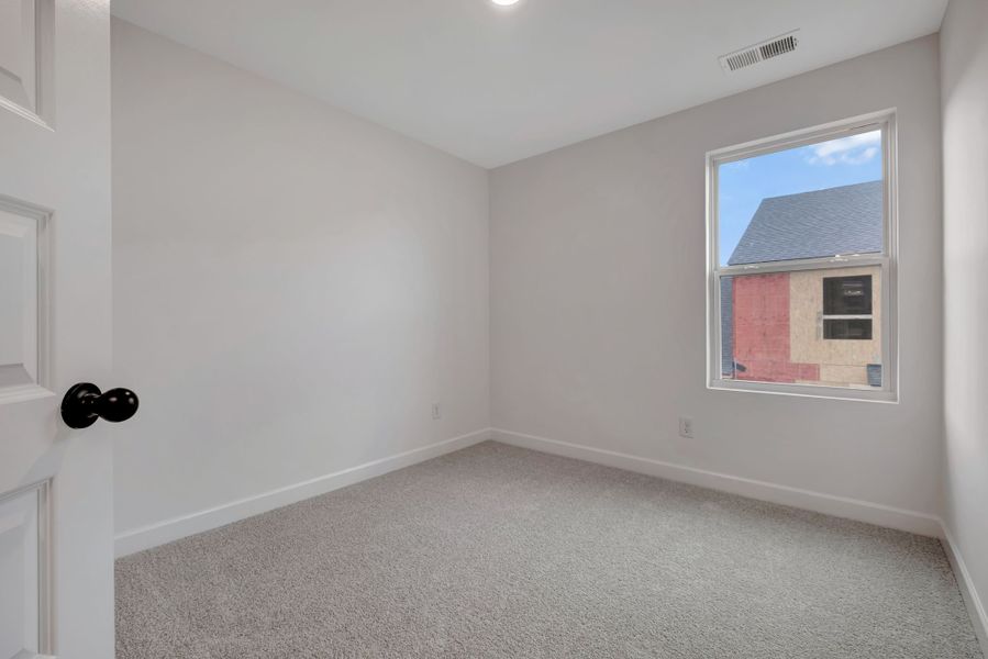 Representative unfurnished interior of a home built from the Ingram Rowhome by Parkside Builders in Anderson Park, Hendersonville (Image 52).