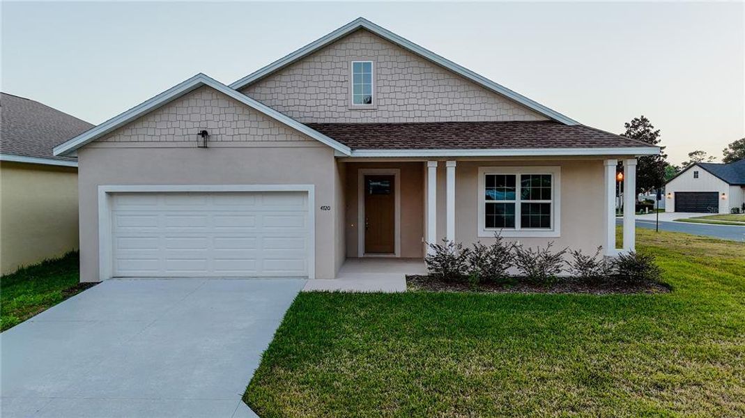 Front exterior of a new home in , Ocala, FL, highlighting curb appeal (Image 19).
