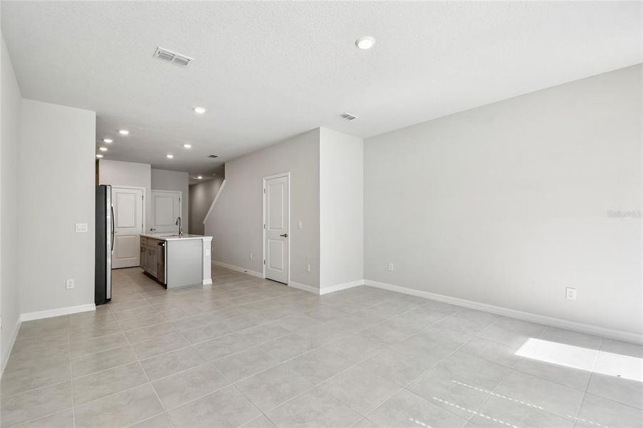 Spacious, unfurnished interior of a new home in Preserve at The Cays – The Driftwood Series, Daytona Beach (Image 28). Spacious, unfurnished interior of a new home in Preserve at The Cays – The Driftwood Series, Daytona Beach (Image 28).