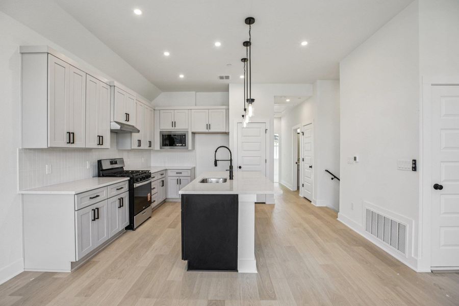 Furnished interior view inside a new home in Koenig Townhomes, Austin (Image 7).