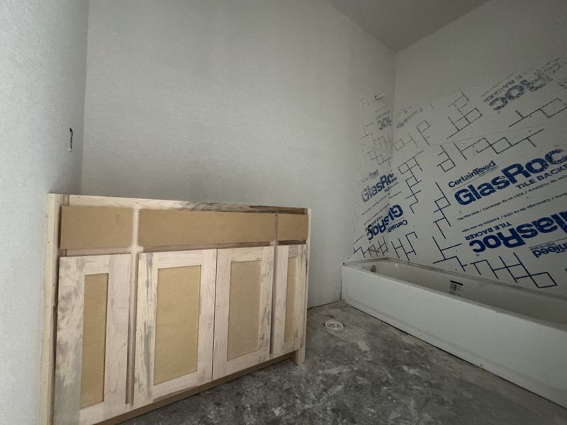 In-progress construction of a new home in Coyote Crossing, Godley, TX (Image 14).