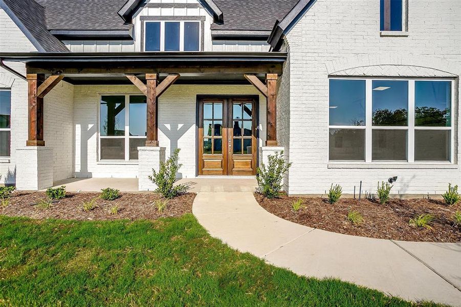 Doorway to property with french doors