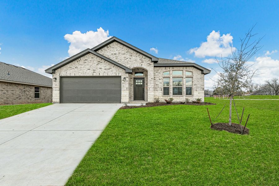Representative exterior photo of a completed home built from the Sherwood by Cheldan Homes in Sunset Ridge, Keene, TX (Image 29). Representative exterior photo of a completed home built from the Sherwood by Cheldan Homes in Sunset Ridge, Keene, TX (Image 29).
