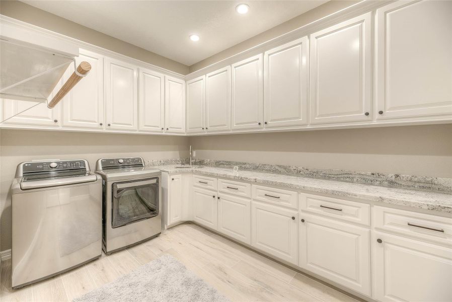 Utility room with plenty of cabinets for storage (Building A) Utility room with plenty of cabinets for storage (Building A)