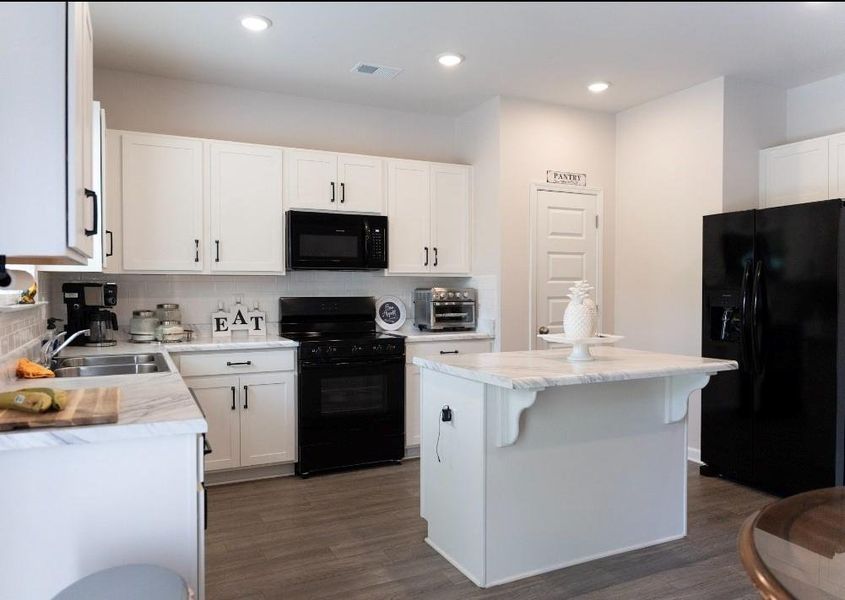 Furnished interior view inside a new home in , Winder (Image 14).