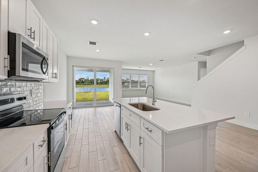 Furnished interior view inside a new home in Brystol at Wylder - Reserve Series, Port St. Lucie (Image 12).