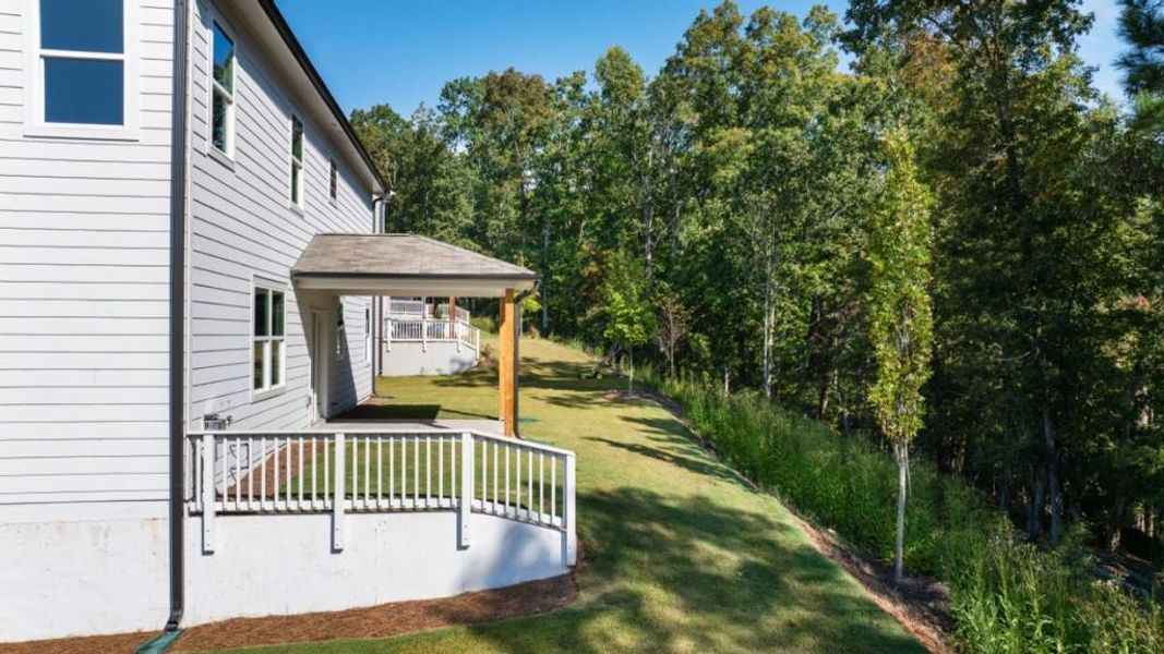 Exterior details and patio area of a home in Falcon Landing, Gainesville (Image 4).