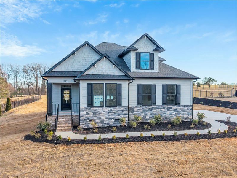 Front exterior of a new home in Cross Creek Golf Club, Seneca, SC, highlighting curb appeal (Image 2).