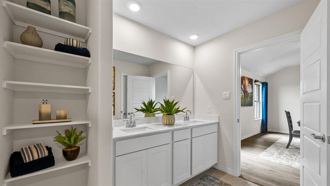 Bathroom featuring double vanity and recessed lighting Bathroom featuring double vanity and recessed lighting