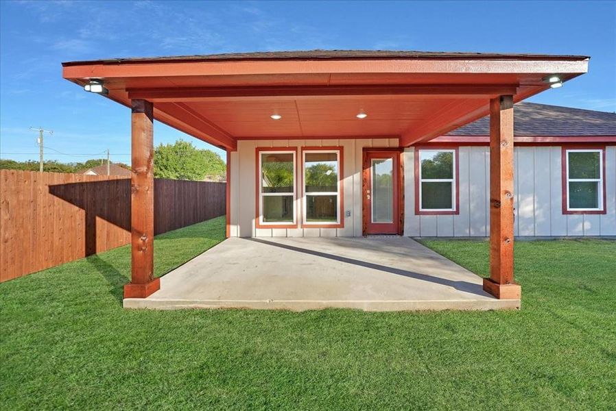 Exterior details and patio area of a home in , White Settlement (Image 4).