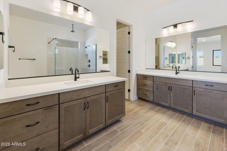 OWNER'S BATH WITH DUAL VANITIES