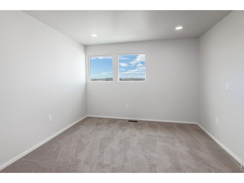 Spacious, unfurnished interior of a new home in Prairie Song Story Collection - Single Family Homes, Windsor (Image 32).