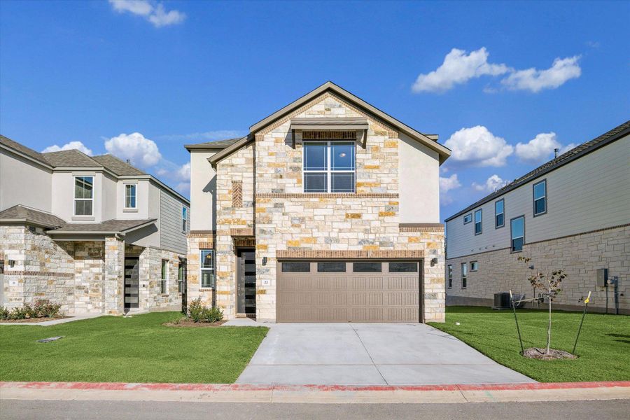 Front exterior of a new home in Chester Ranch Place, Round Rock, TX, highlighting curb appeal (Image 1). Front exterior of a new home in Chester Ranch Place, Round Rock, TX, highlighting curb appeal (Image 1).