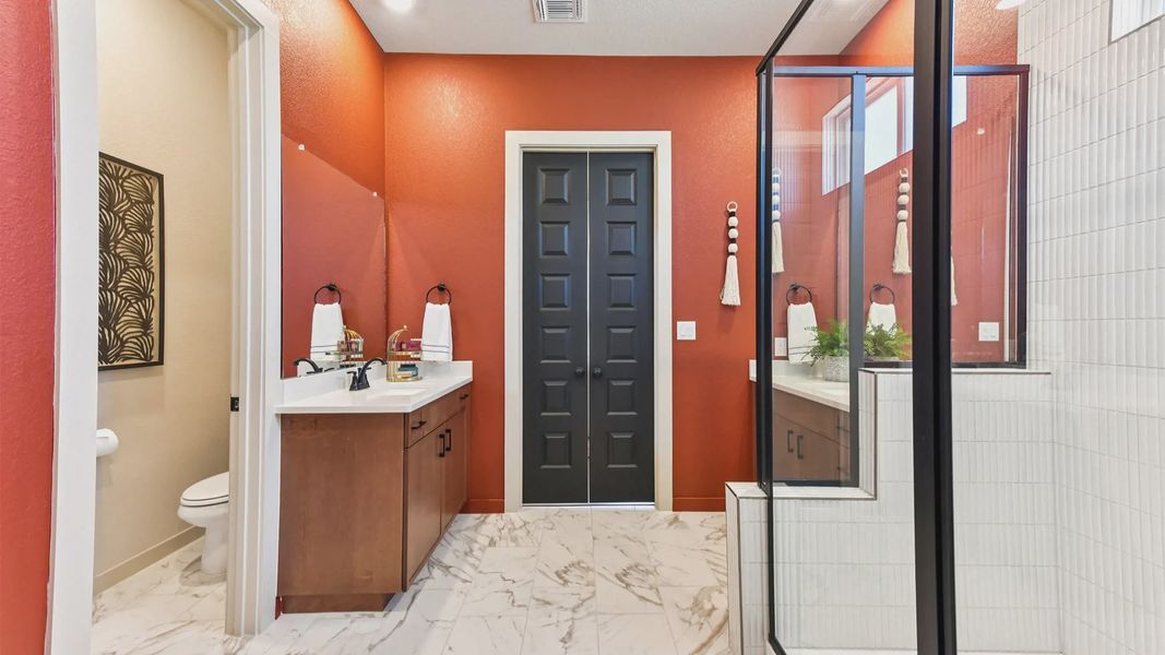 Representative furnished interior of a home built from the Peyton by Chesmar Homes in The Grove at Blackhawk, Pflugerville (Image 36).