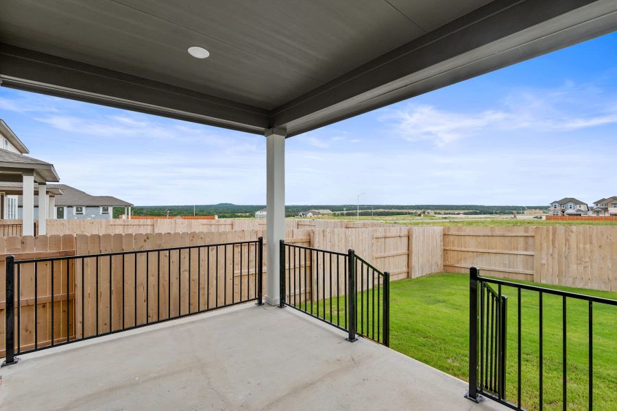 Exterior details and patio area of a home in Lariat, Liberty Hill (Image 4).