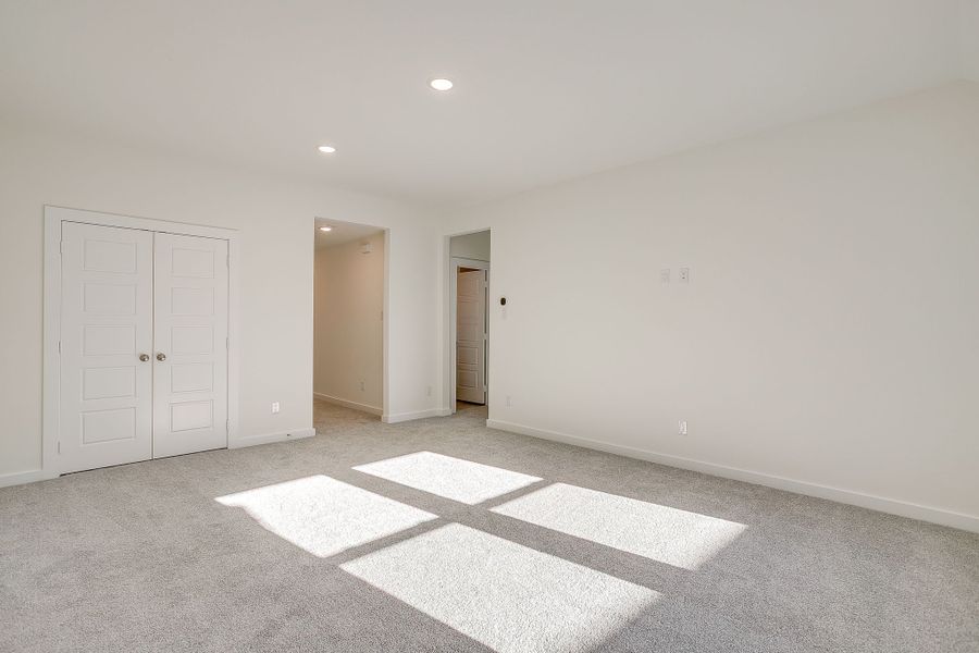 Representative unfurnished interior of a home built from the Palmer by Graham Hart Home Builder in Bear Ridge, Burleson (Image 17).