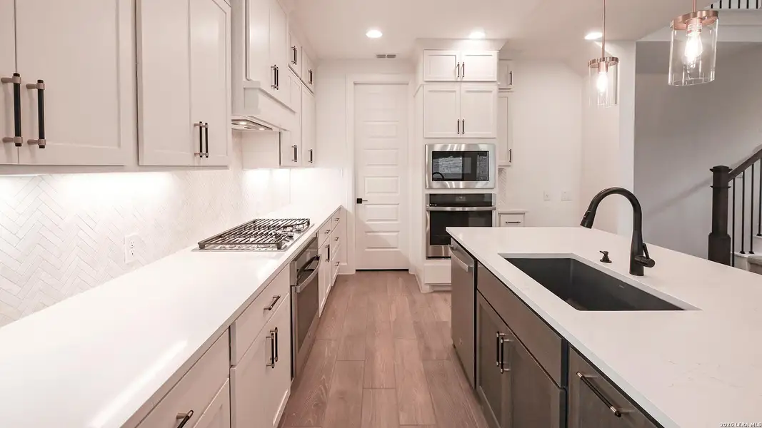 Furnished interior view inside a new home in Hidden Canyon, San Antonio (Image 9).
